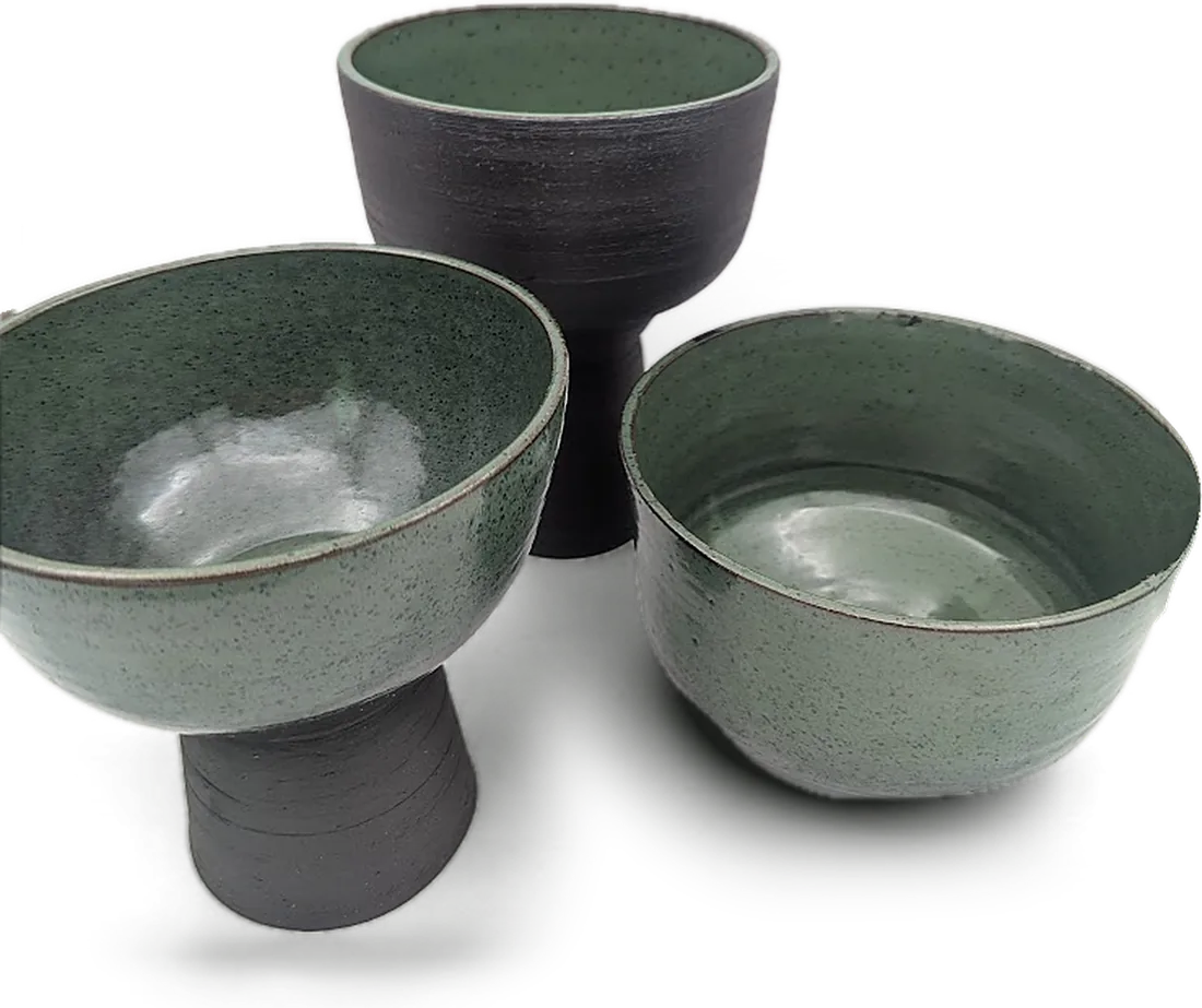 Three handmade ceramic bowls in speckled sage and charcoal