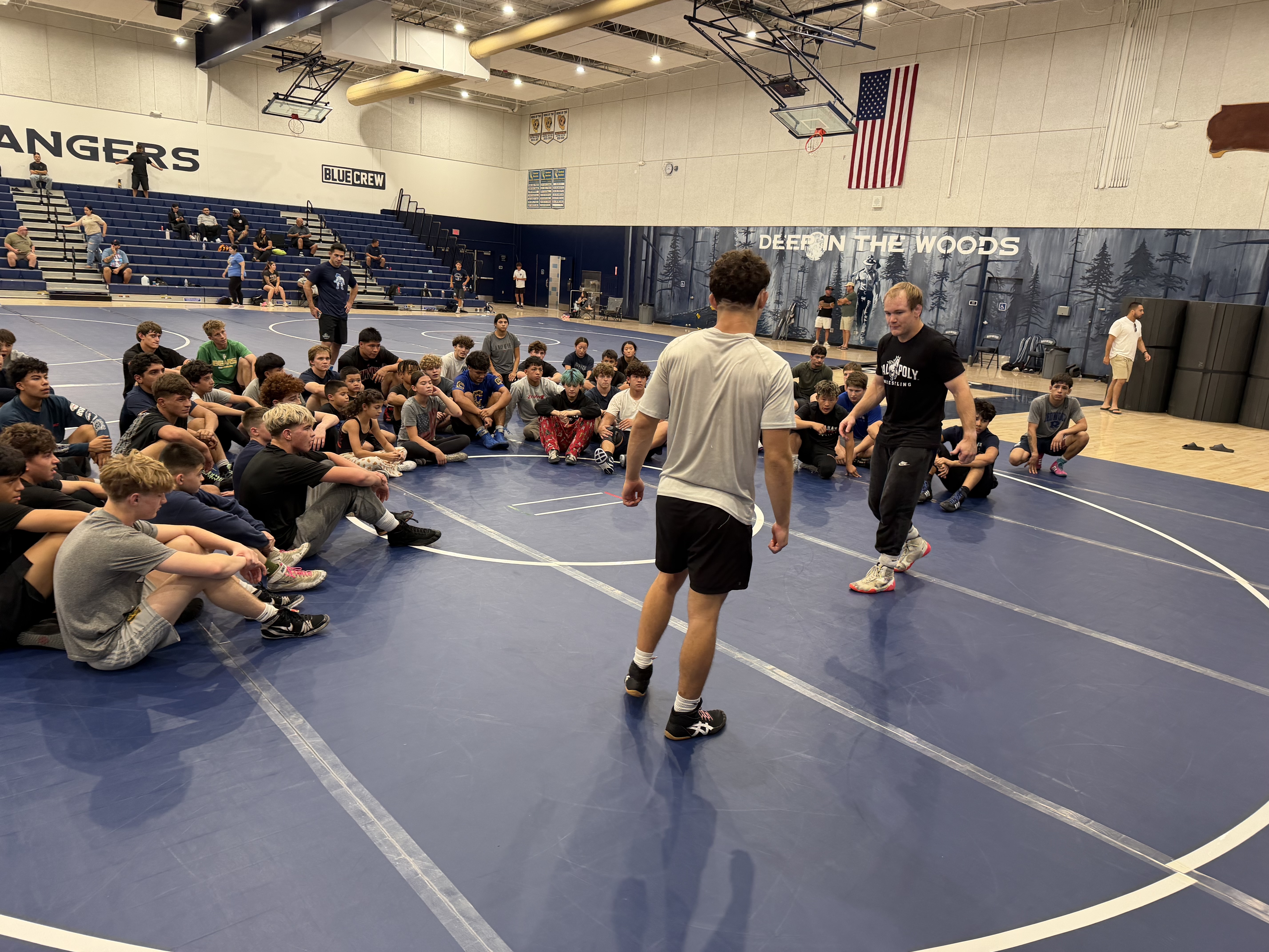 Current Mustang wrestlers leading a clinic at the Valley Clinic and Social